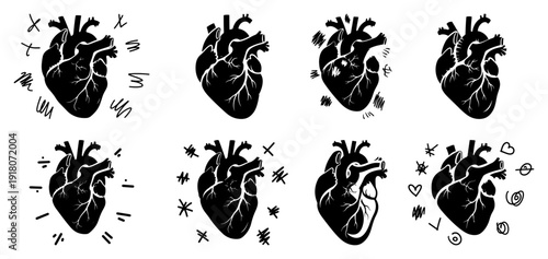 Set of hand drawn anatomical human hearts with creative doodle elements and sketch lines
