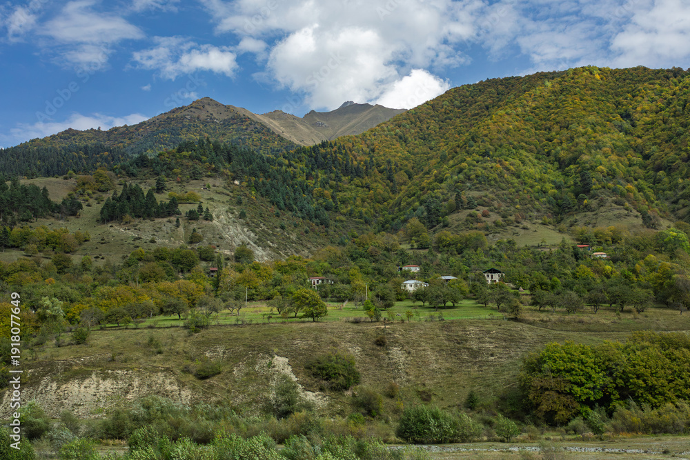 Fototapeta premium Autumn Mountain Landscape With Rural Village And Forest In Georgia