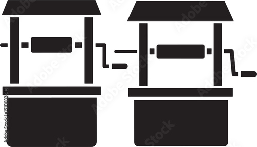 Two water well silhouette with rope and crank