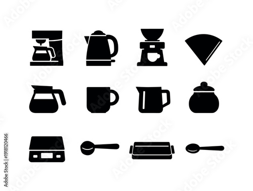 Home coffee brewing station: drip coffee maker, electric kettle, coffee grinder, paper filter, glass carafe, ceramic mug, milk pitcher, sugar jar