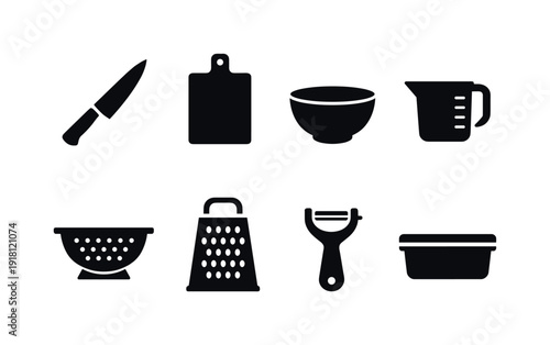 Kitchen meal prep tools: chef knife, cutting board, mixing bowl, measuring cup, colander, grater, peeler, food container