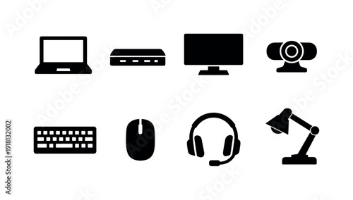 Office hybrid work setup: laptop, docking station, external monitor, keyboard, mouse, webcam, headset, desk lamp