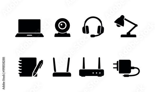 Office remote work setup: laptop, webcam, headset, desk lamp, notebook, pen, router, power adapter