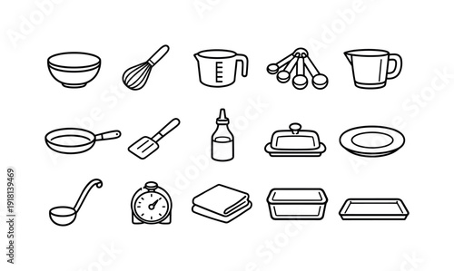 Home kitchen pancake prep tools: mixing bowl, whisk, measuring cup, measuring spoon, batter jug, frying pan, spatula, oil bottle, butter dish, plate