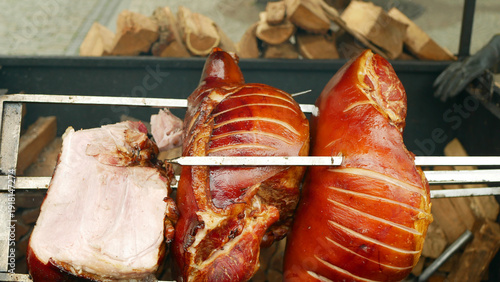 Prague ham leg meat smoked boneless Prazska sunka authentic traditional Czech pork close-up large piece of delicious outdoor street market food stall delicately smokes brined-cured stewed mildly
