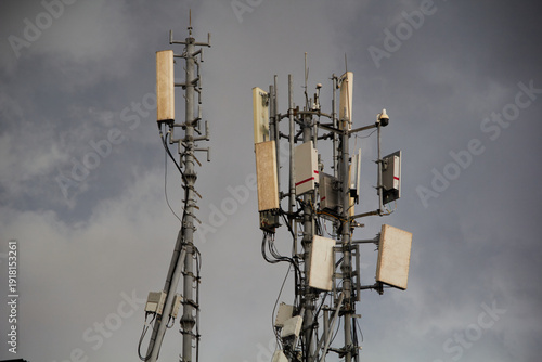 cell phone towers with sky background 