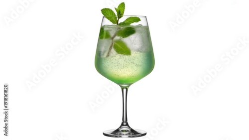 Refreshing green mint cocktail with ice cubes and fresh mint leaves in a stemmed wine glass, isolated on a transparent background.