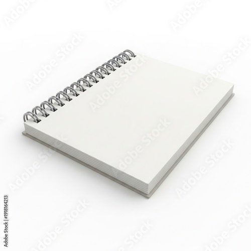 Spiral-bound blank notebook resting on a flat surface with a metallic spiral binding.