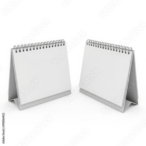 Two blank white standing easels with spiral-bound pages for writing or drawing