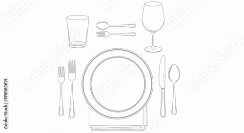 Formal dinner table setting with cutlery and glassware.