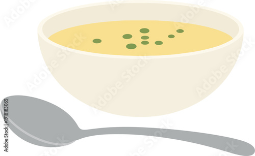 A bowl of creamy soup with a spoon