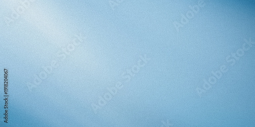 A blue background with a white light shining on it