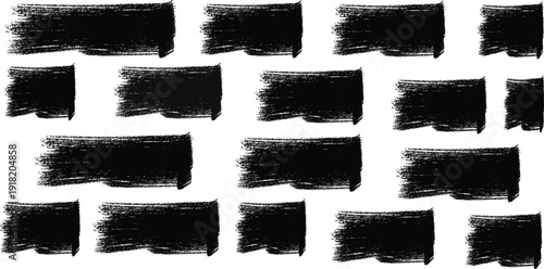 A collection of 16 black squares with rough edges on a white background