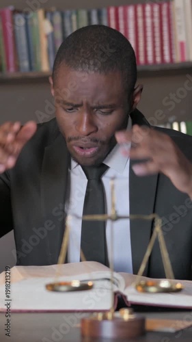 Wallpaper Mural African American Lawyer Upset while Reading Law Book before Court, Vertical Video Torontodigital.ca
