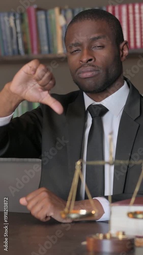 Wallpaper Mural African American Lawyer Doing Thumbs Down in Office, Vertical Video Torontodigital.ca