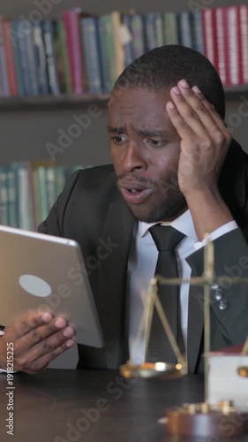 Wallpaper Mural African American Lawyer Upset by Loss on Tablet in Office, Vertical Video Torontodigital.ca