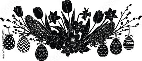 Beautiful black and white easter eggs hanging from a floral arrangement of tulips and daffodils