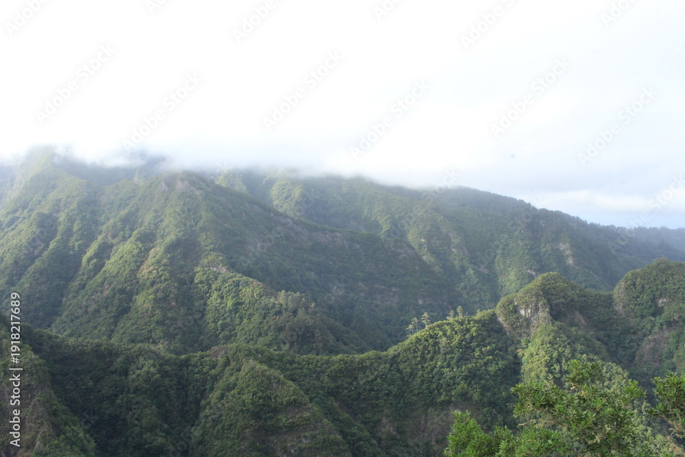 Obraz premium Mountain ridge covered in clouds, Madeira Island Portugal