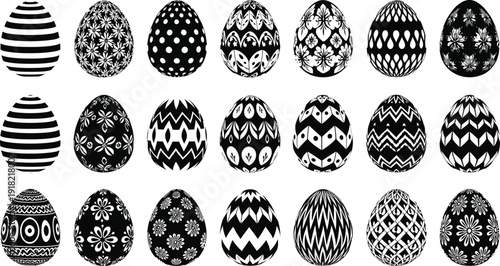 Collection of twenty one intricately designed easter eggs in black and white patterns displayed