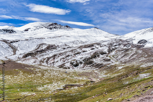 Wallpaper Mural Scenic view of snow-covered peaks and rugged mountain terrain in the Peruvian Andes, captured from the hiking path to Rainbow Mountain. Torontodigital.ca