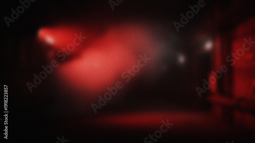 Foto Dim Red Spotlight Illuminates Smoky Dark Room Dramatic Atmosphere
