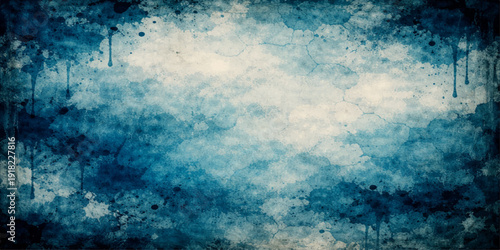 A beautiful bright blue grunge background texture featuring abstract white clouds and summer sunlight in a clear heaven sky with copy space for a beautiful nature atmosphere