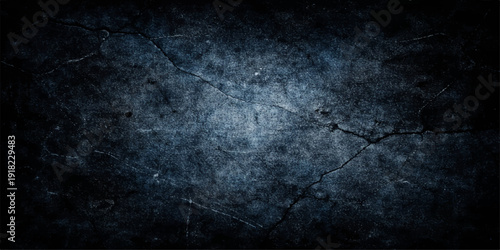 A dark blue grunge texture features a vintage blank concrete wall with a rough old stone pattern, creating a dark dirty paper backdrop and empty gray blackboard surface design