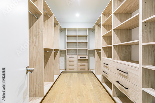 Canvas Print Modern Walk In Closet With Custom Wood Built In Shelving and Drawers in Luxury R