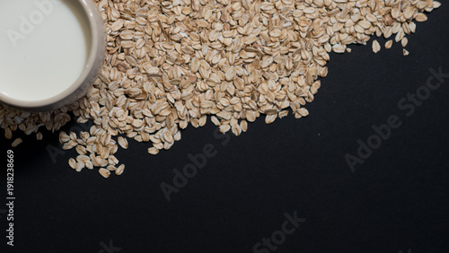 Oat Milk in Mug on Oat Flakes, Vegan Lactose Free Breakfast