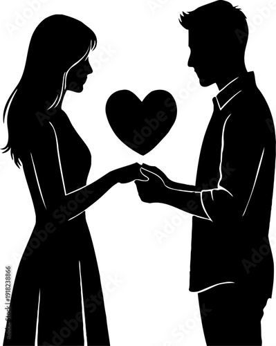 Silhouette of loving couple holding a heart