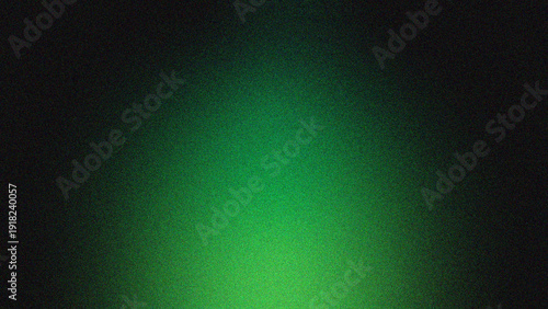 Abstract Background with Vibrant Green Light Gradient Emitting from Darkness and Grainy Texture