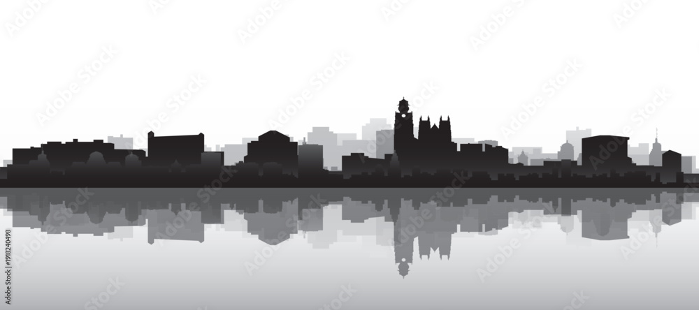 Obraz premium Black and white panoramic poster of the city skyline with misty background buildings and water reflection of NANTES, FRANCE