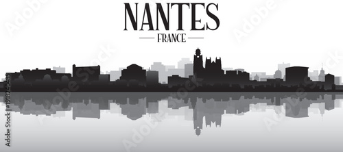 Black and white panoramic poster of the city skyline with misty background buildings and water reflection of NANTES, FRANCE