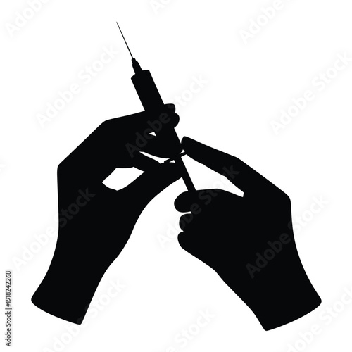 Hands preparing a syringe for injection depicted in a stark silhouette