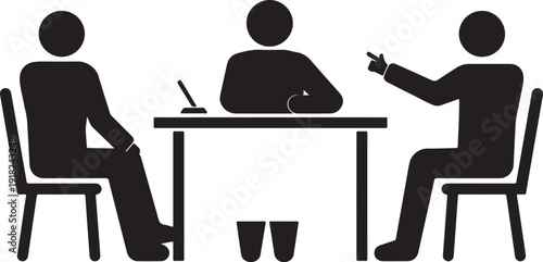 Three people sitting at a table with one person pointing and another writing chairs