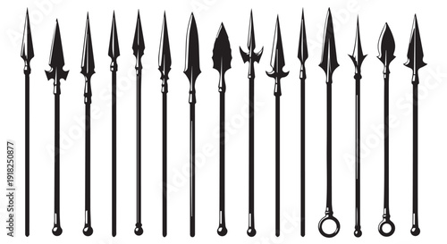 A collection of medieval spearheads and polearms arranged in a row, showcasing various historical designs and craftsmanship.