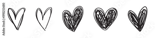 Doodle hearts drawn by hand. Grunge scrawls, chalk scribbles, rough brush strokes, underlines and circles. Bold charcoal freehand hearts. Crayon or marker scribbles