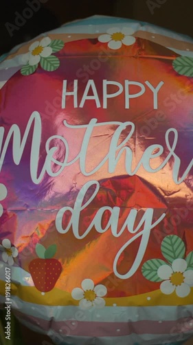 Happy Mothers Day balloon turns to reveal message greeting
