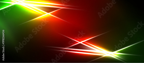 Bright abstract lines intersect. Vivid colorsred, green, yellowcreate dynamic visual effect. Dark background emphasizes luminosity.