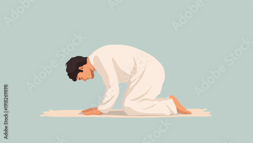 Person in white garment kneeling on a light mat with head bowed