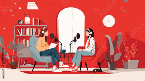 Two women in cozy chairs, wearing headphones, recording a podcast in a vibrant red studio