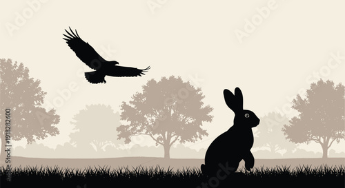 Dramatic nature silhouette landscape showing a flying eagle diving towards a sitting rabbit in a grassy field with trees.