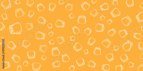 A vibrant orange background with white animal print pattern viewed from directly above