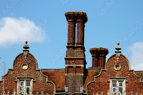 Photos The chimneys and rooftop of a Tudor building, England.