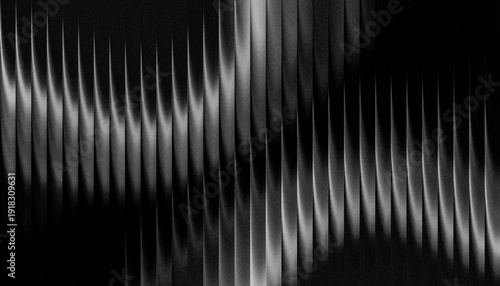 Fotografie Grainy ribbed abstract monochrome image with dynamic wavelike patterns and gradi
