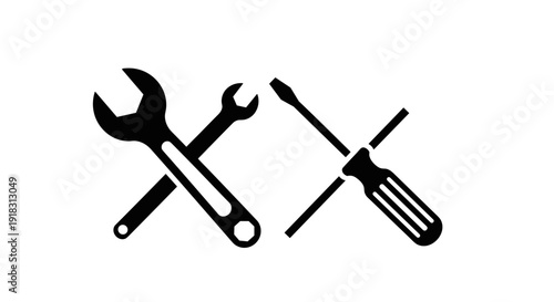 Wrench and screwdriver crossed tools.