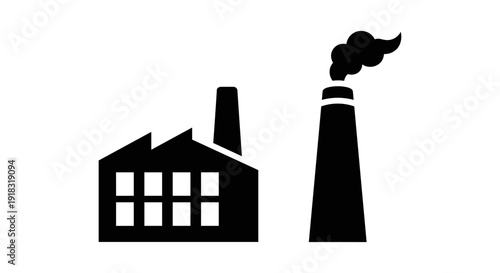 Industrial factory building with smokestack.