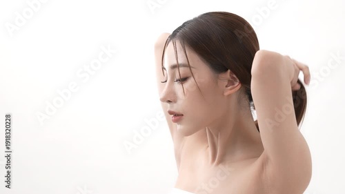 Wallpaper Mural Beauty concept of 4k Resolution. Asian woman touching hair on white background. Torontodigital.ca