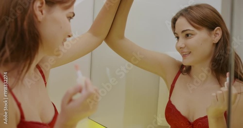 Wallpaper Mural Holiday concept of 4k Resolution. Caucasian woman applying lipstick in front of mirror in bathroom, morning beauty routine. Torontodigital.ca