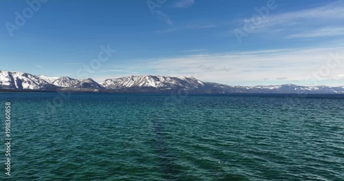 South Lake Tahoe, CA, USA - 02-15-2026  Aerial video of South Lake Tahoe, California and Stateline, Nevada on a winter afternoon.  
